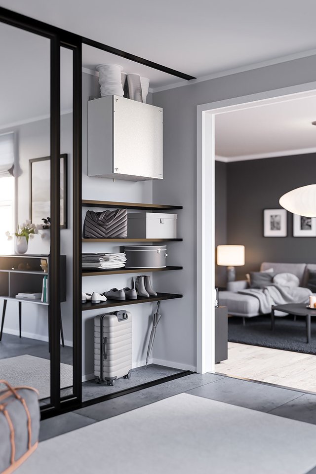 Nordic air handling unit concealed behind mirrored wall in apartment